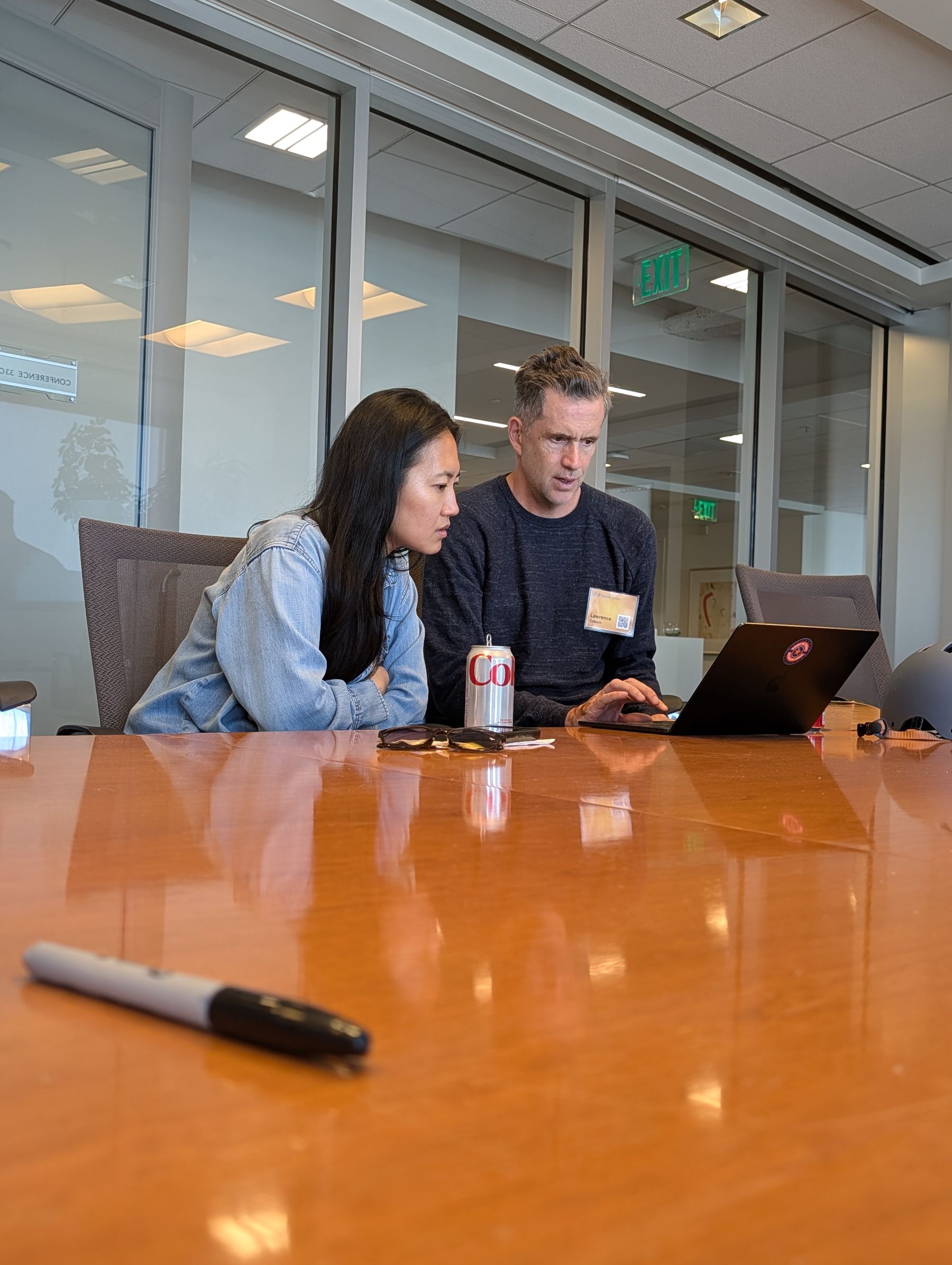 Two people working together at a FounderNexus gathering